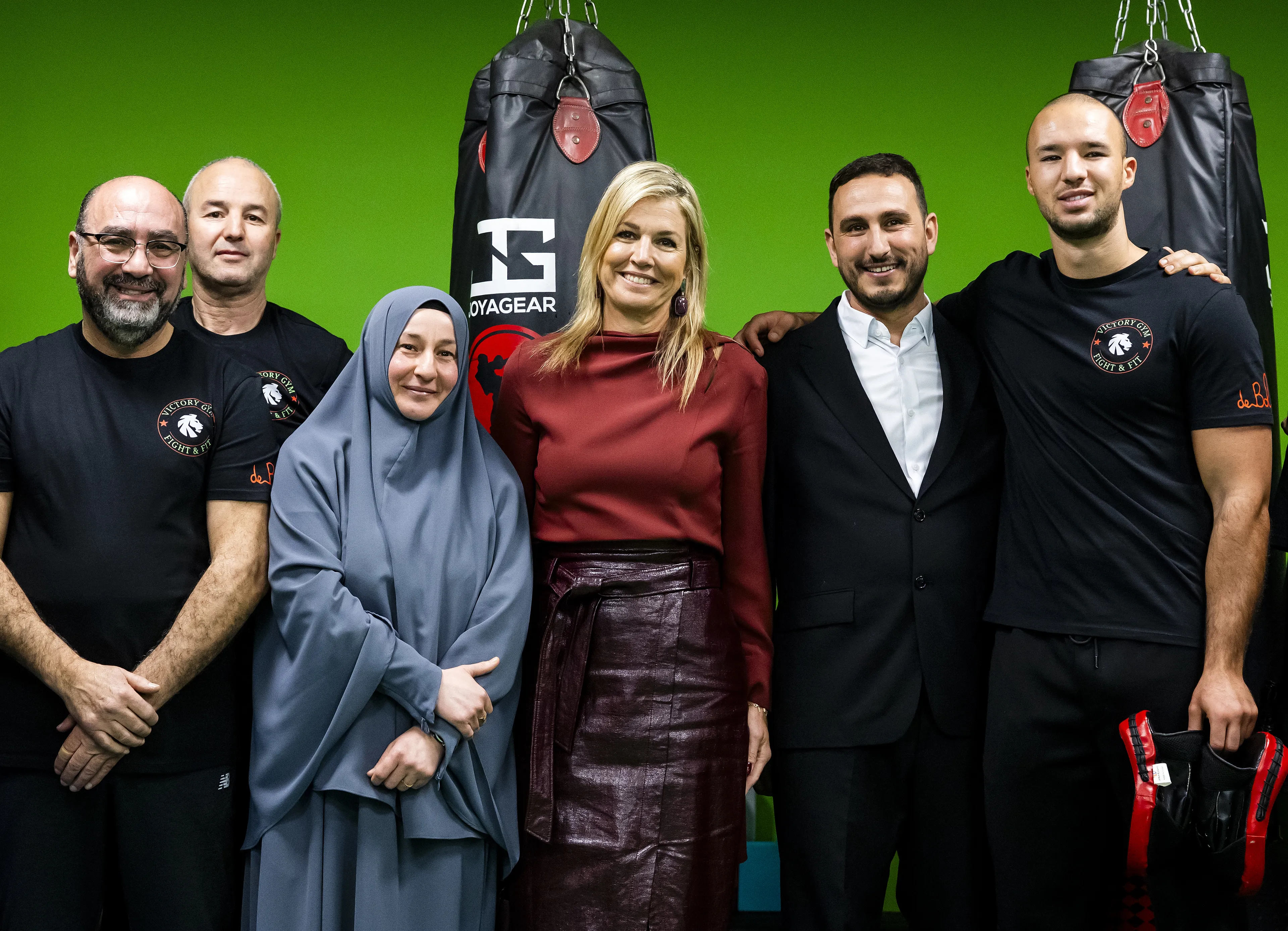 Máxima met de sporters en vrijwilligers.