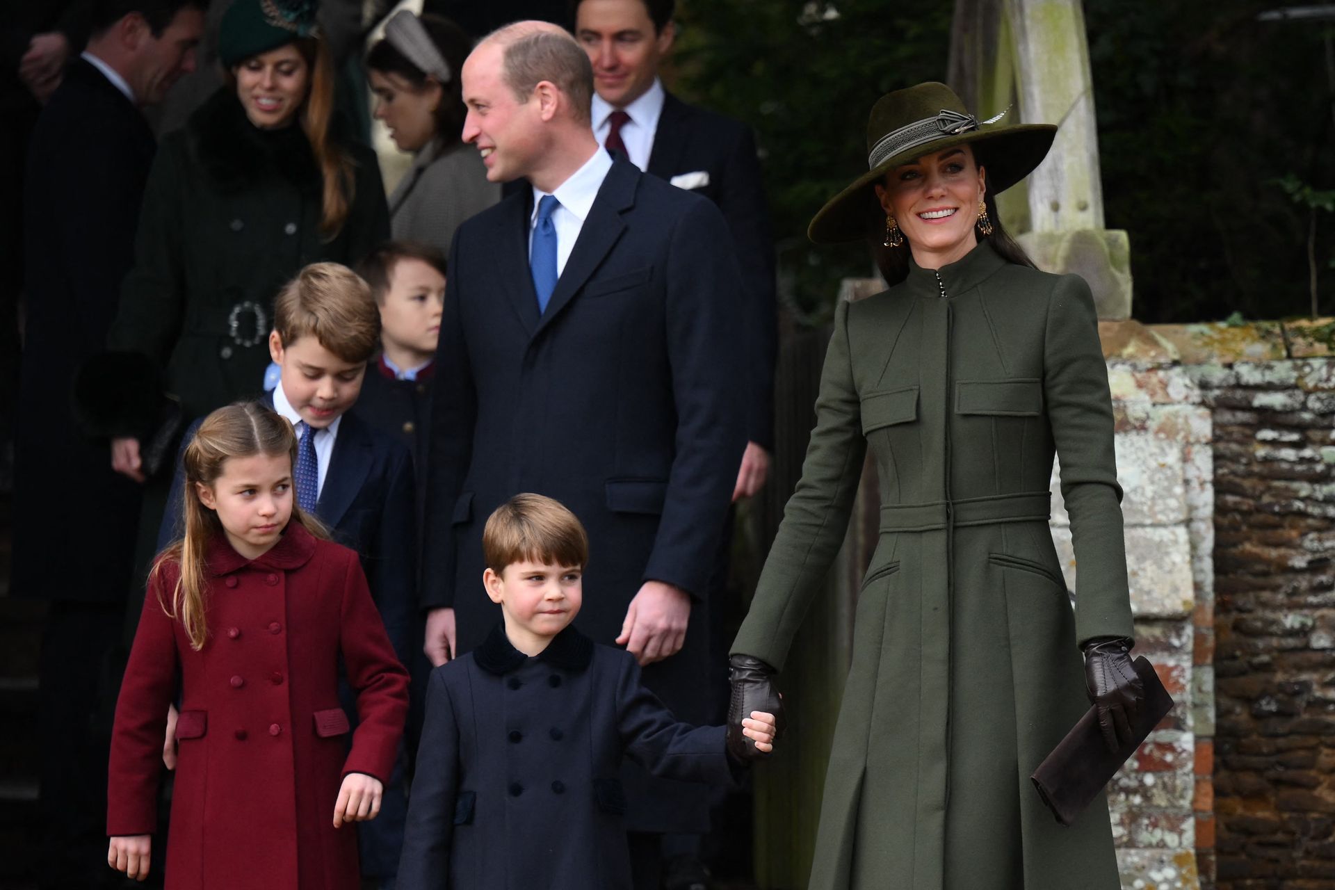 De koninklijke familie na de kerstdienst op Sandringham in 2022.