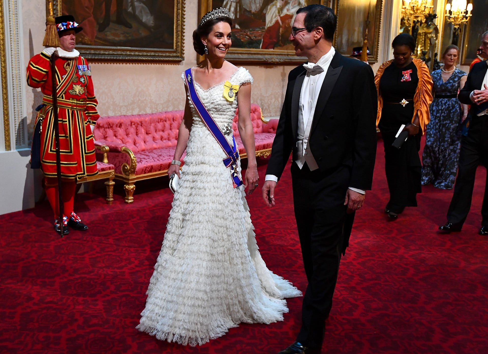 Catherine naast de Amerikaanse minister van financiën, Steven Mnuchin