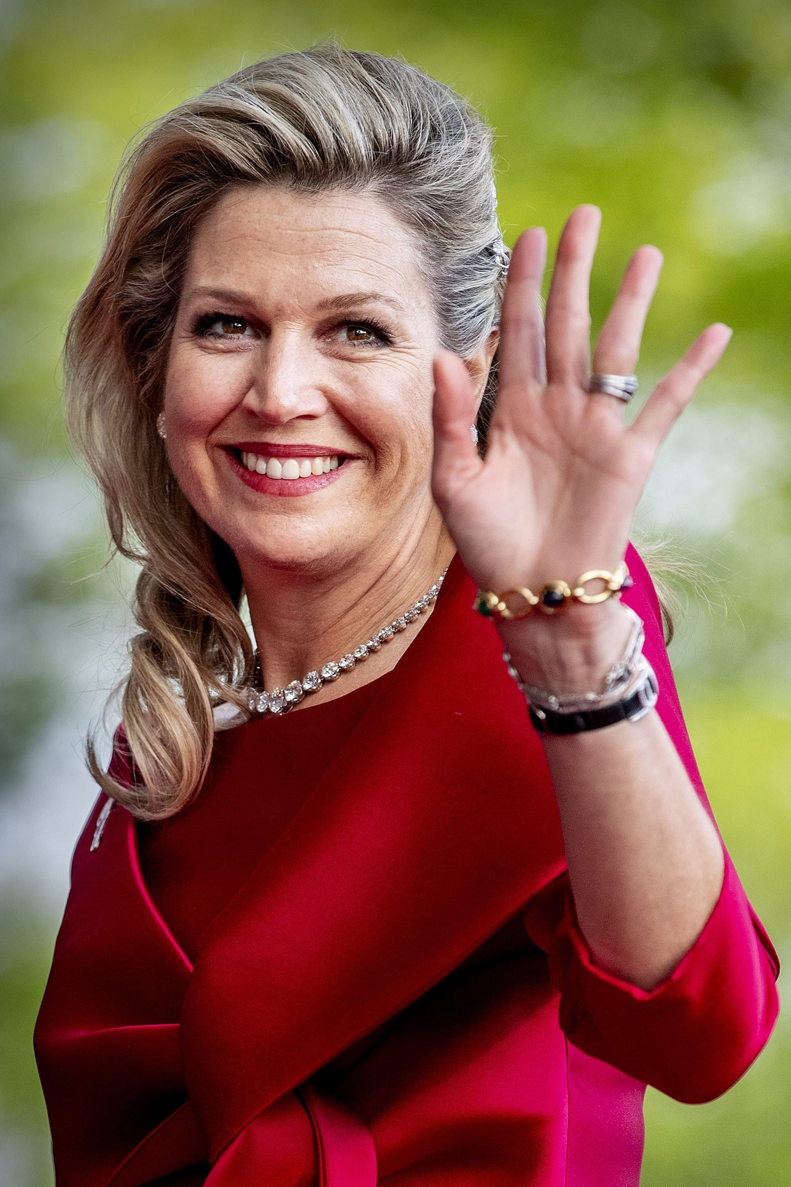 Tijdens het 5 mei-concert op en rond de Amstel steelt koningin Máxima de show in een rode pantalon