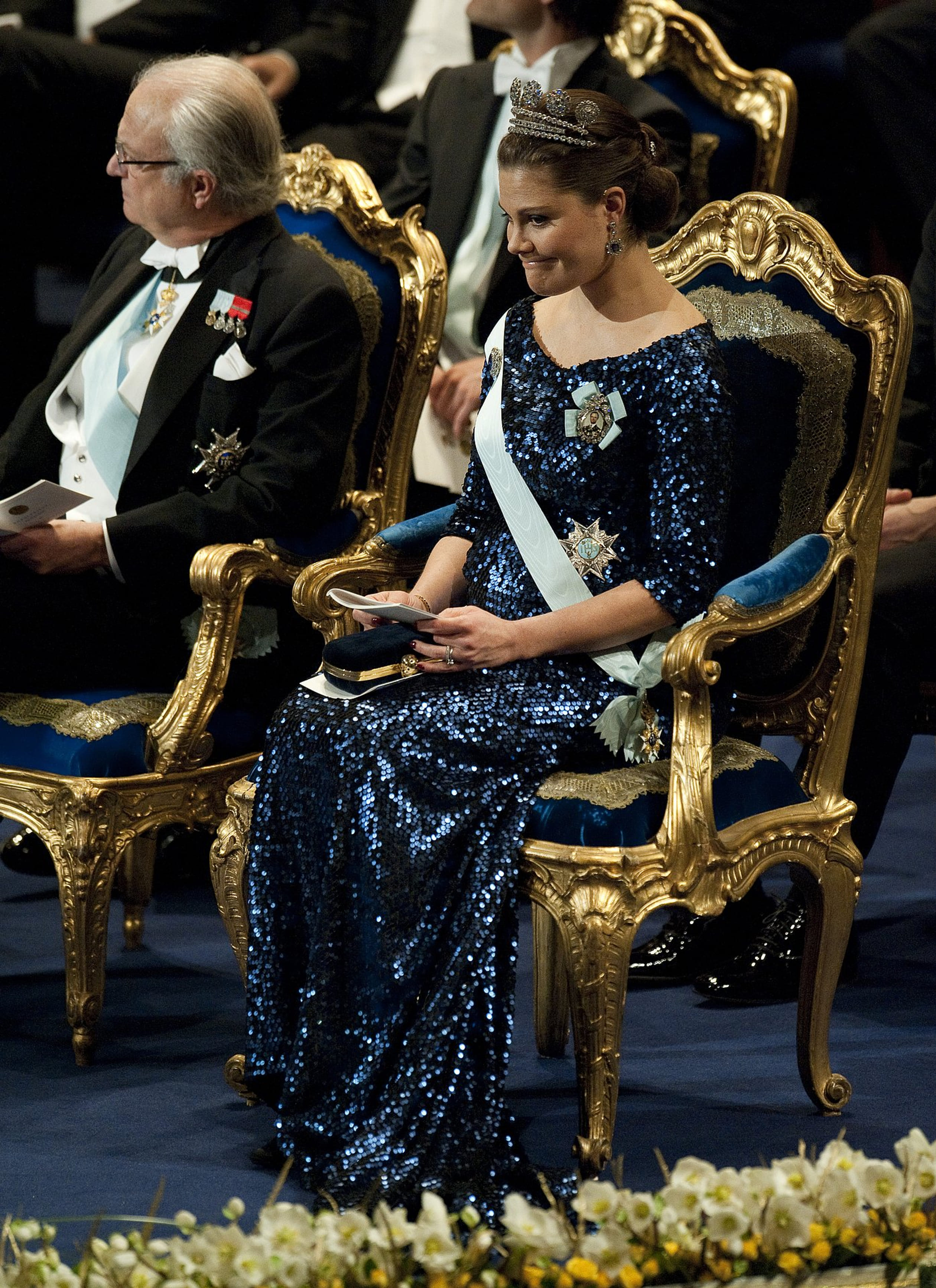 2011: Kroonprinses Victoria in verwachting van prinses Estelle. Ze schittert in pailletten.