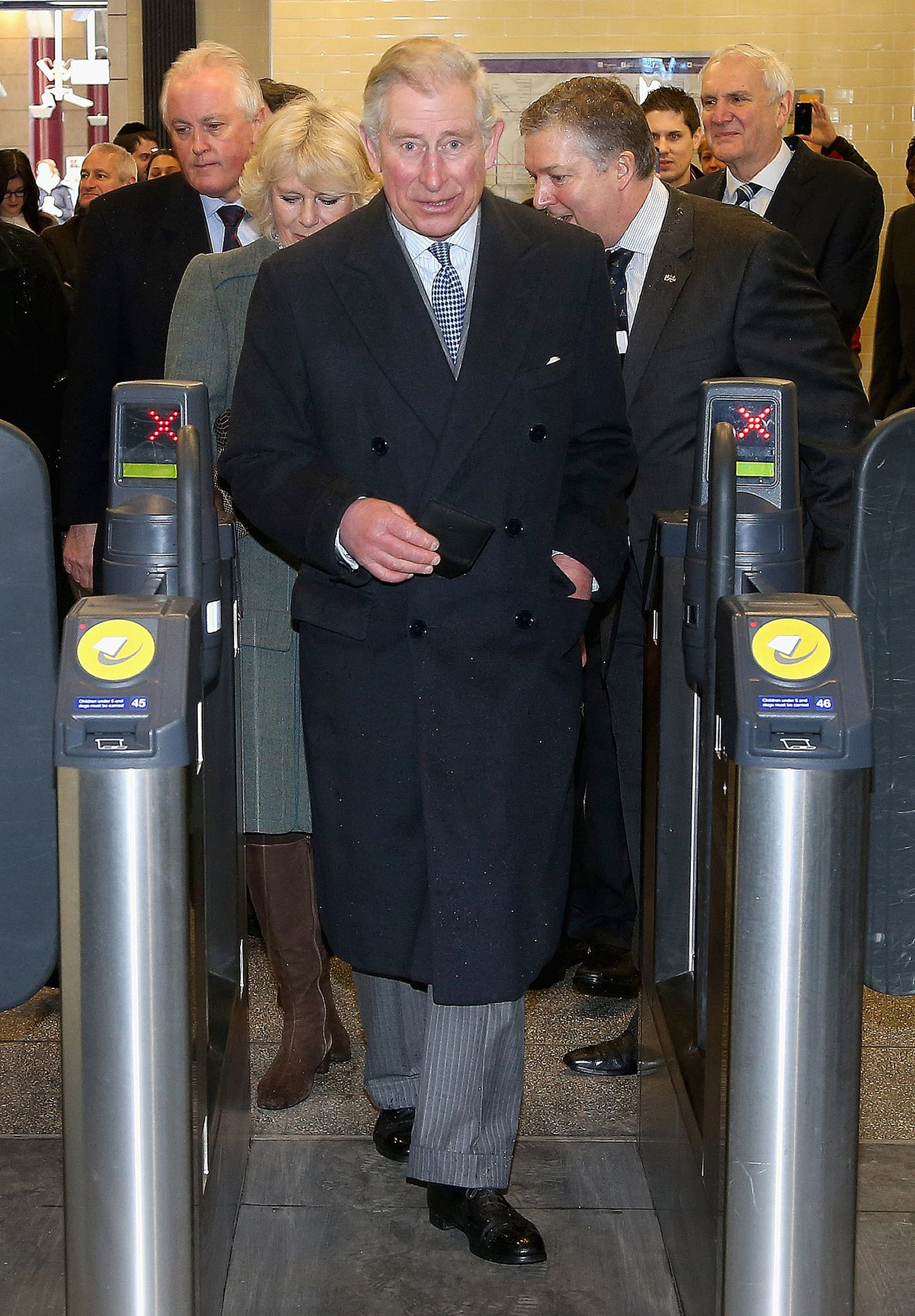 Prins Charles en Camilla vergeten niet in te checken.