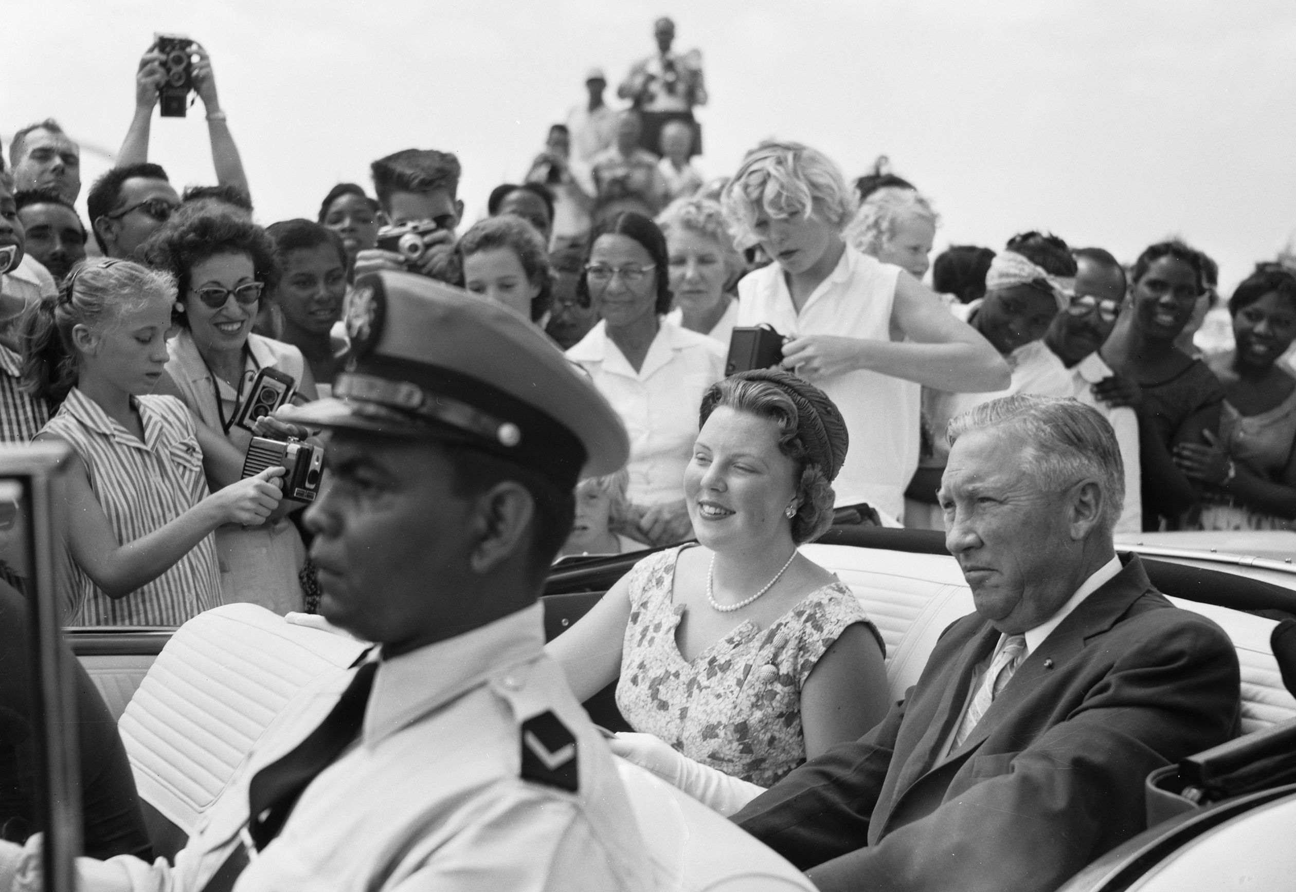 February 1958: At the age of 20, Beatrix visits the island of Aruba.  There she is warmly welcomed by a cheering crowd.