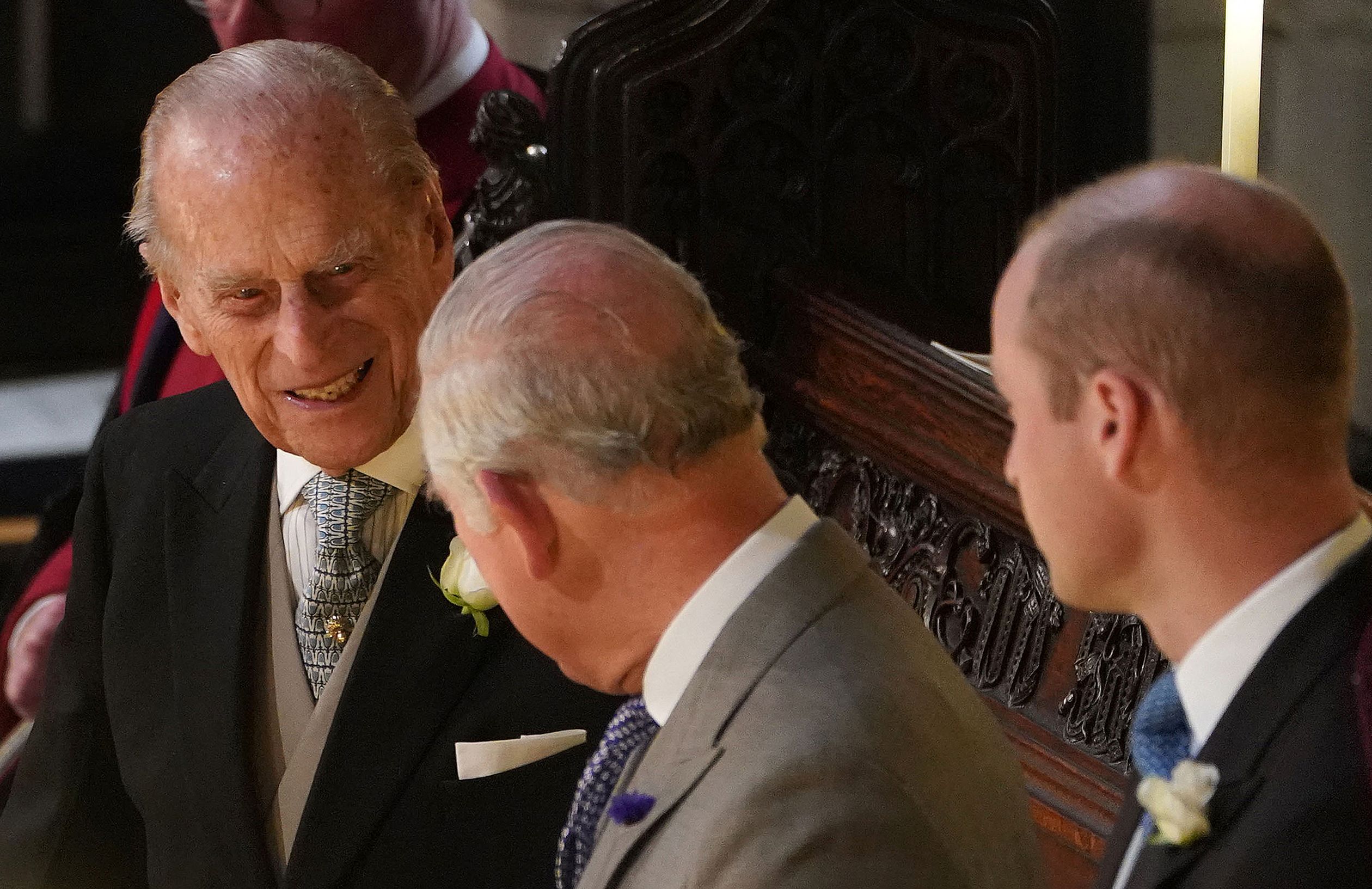 Met prins Charles en William tijdens het huwelijk van prinses Eugenie, 2018.