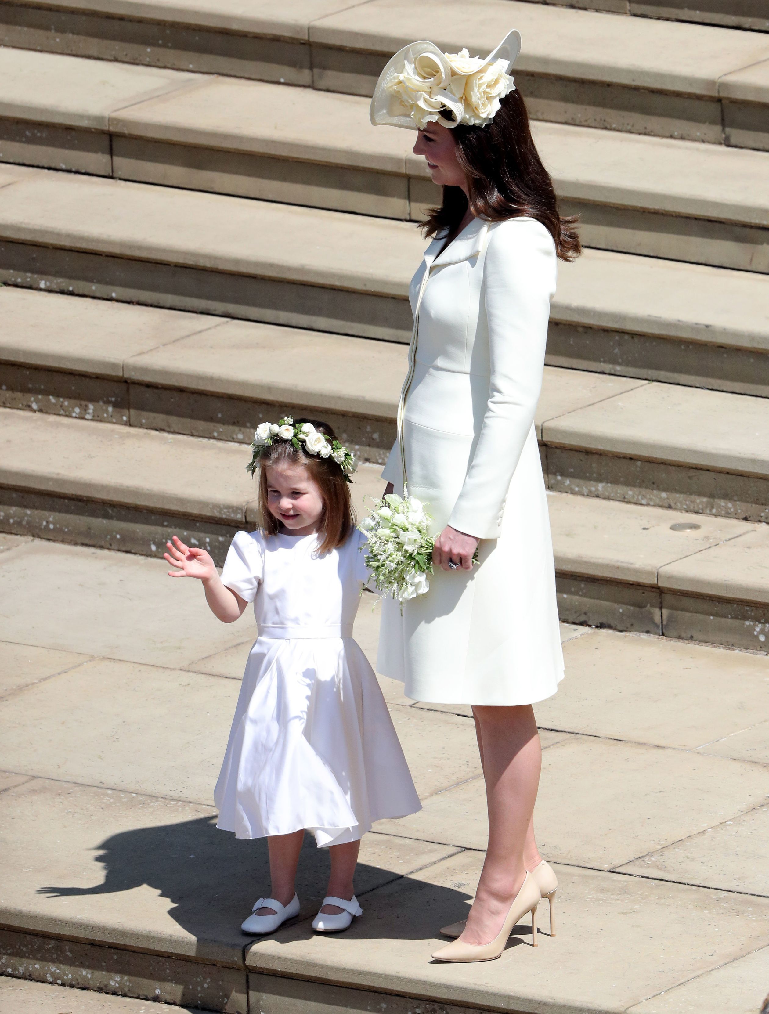Catherine en dochter Charlotte tijdens de bruiloft van prins Harry en Meghan op 19 mei 2018.