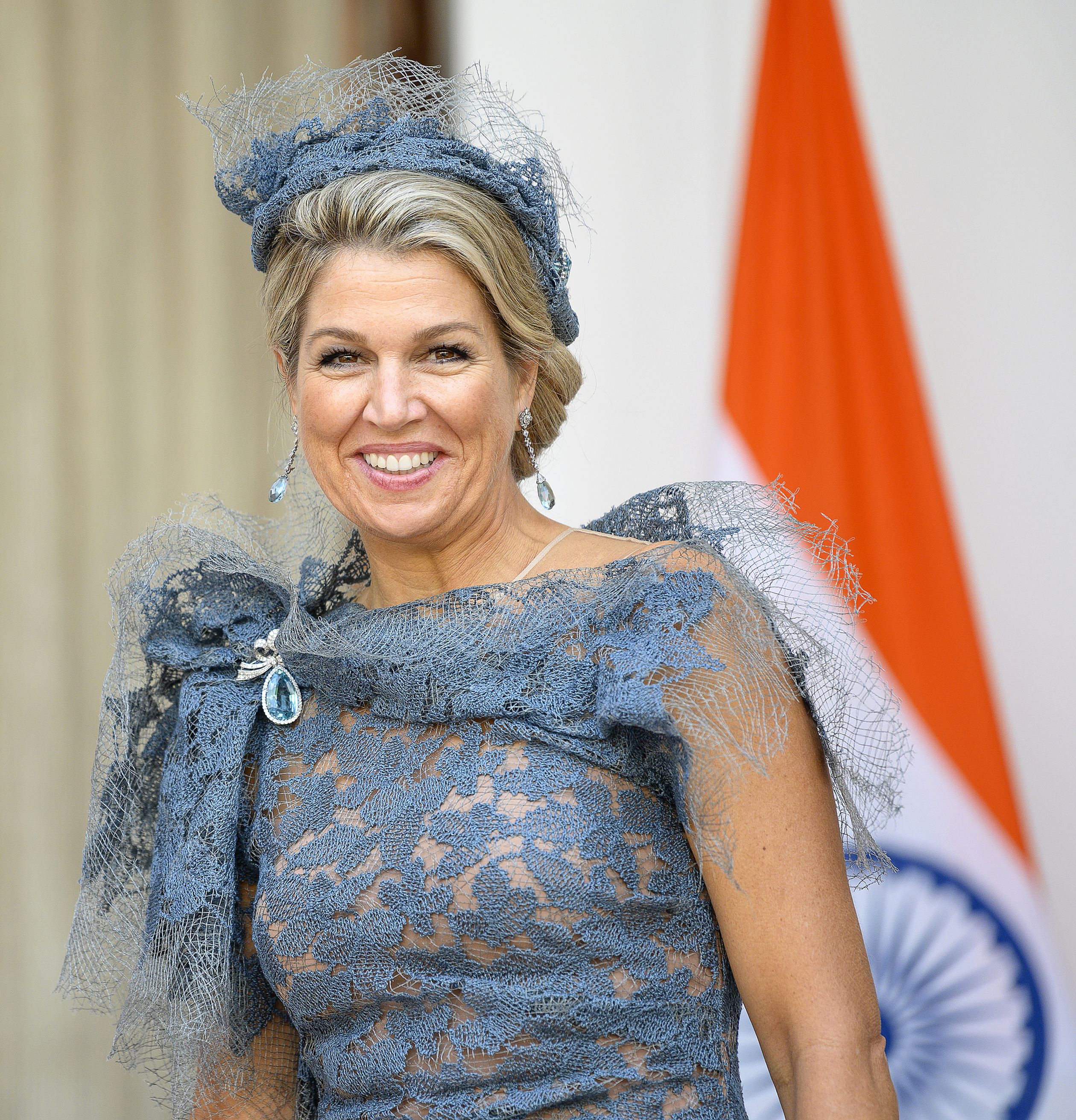 Koningin Máxima draagt een nieuwe jurk van Edouard Vermeulen van modehuis Natan.