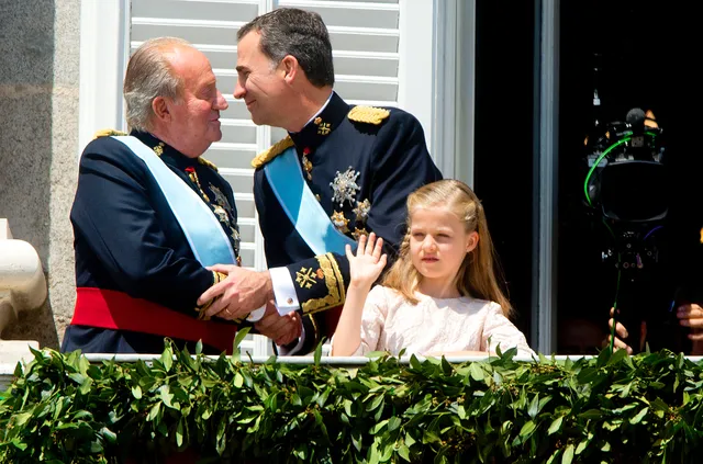 MADRID - King Felipe, Queen Letizia, Princess Leonor and Princess Sofia, Juan Carlos , and Infantas Leonor Sofia and Princess Elena at palace balkony of the new Spanish king in Madrid, Spain, 19 June 2014. After the investiture ceremony King Felipe and his family attend military parade.COPYRIGHT ROBIN UTRECHT.